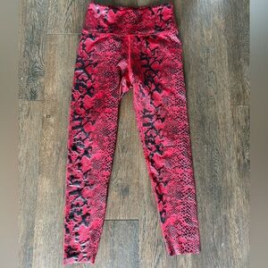 Size small new without tags AR33 red leggings with black snakeskin print.